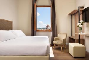 Postel nebo postele na pokoji v ubytování Essence Hotel + 7 fotografií