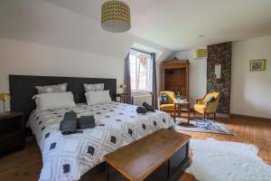 Postel nebo postele na pokoji v ubytování Chalet des longschamps
