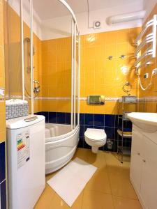 Ένα μπάνιο στο Apartament Malwa Jurata