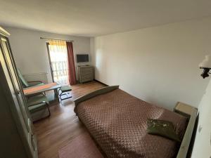 Postel nebo postele na pokoji v ubytování Ranczo Pindorówka