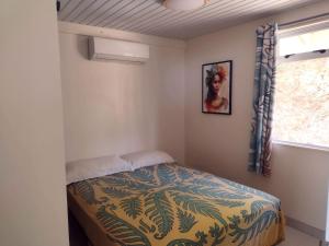 Postel nebo postele na pokoji v ubytování Moorea - Atiha bay MH2