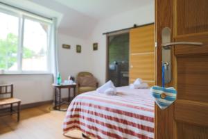 Postel nebo postele na pokoji v ubytování Chalet des longschamps