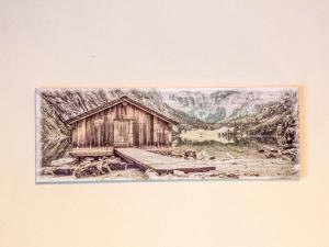 eine Zeichnung einer Holzhütte mit Brücke in der Unterkunft Apartment la Ferme de Sandra F0 by Interhome in Nendaz