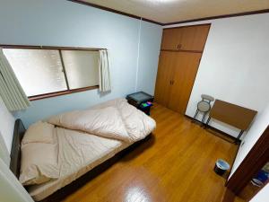 2階建1棟貸しの寝室4部屋 無料高速Wi-Fi客房内的一张或多张床位