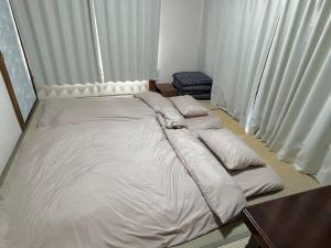 2階建1棟貸しの寝室4部屋 無料高速Wi-Fi客房内的一张或多张床位
