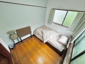 2階建1棟貸しの寝室4部屋 無料高速Wi-Fi客房内的一张或多张床位