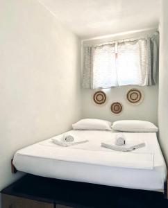 Postel nebo postele na pokoji v ubytování Moxy Paxos Apartments