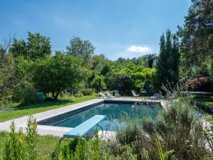 a swimming pool in the yard of a house at Holiday Home Carla by Interhome in Cortazzone