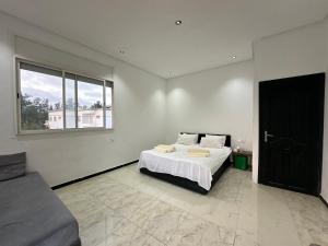 Ένα ή περισσότερα κρεβάτια σε δωμάτιο στο Villa Hay Riad