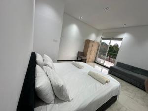 Ένα ή περισσότερα κρεβάτια σε δωμάτιο στο Villa Hay Riad