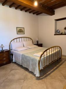 Postel nebo postele na pokoji v ubytování Villa aquila