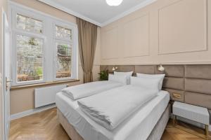 Postel nebo postele na pokoji v ubytování Residenz Hugo