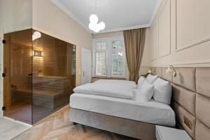 Postel nebo postele na pokoji v ubytování Residenz Hugo