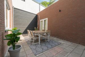 Patio nebo venkovní prostory v ubytování Home City Hotspot, Near City Center And Park