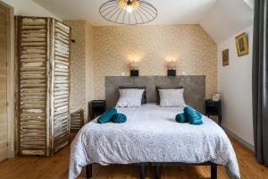 Postel nebo postele na pokoji v ubytování Chalet des longschamps