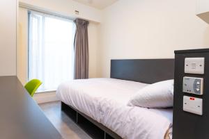 En eller flere senge i et værelse på Aparto Dorset Point in Dublin City Centre