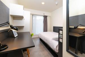 En eller flere senge i et værelse på Aparto Dorset Point in Dublin City Centre