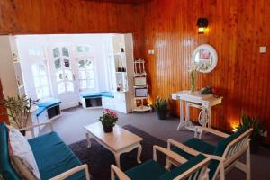 Posezení v ubytování Heavenly Home Inn