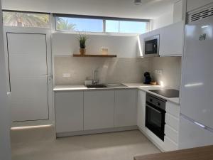 Kuchyň nebo kuchyňský kout v ubytování Descanso junto a las dunas