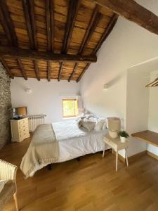 Ένα ή περισσότερα κρεβάτια σε δωμάτιο στο El Encanto de Bustares