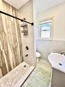 Koupelna v ubytování Modern Apartment - 3 Bedrooms, 2 Bathrooms