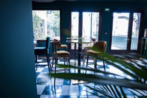 Posezení v ubytování Logis VIGNES BLANCHES*** Hôtel Cosy et restaurant de terroir