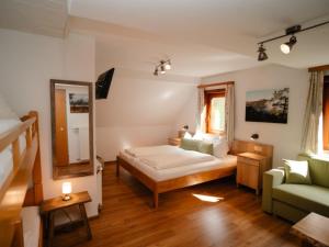 Postel nebo postele na pokoji v ubytování Apartment Grimming by Interhome