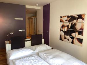 Postel nebo postele na pokoji v ubytování Hotel Krainerhütte