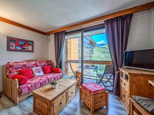 Et tv og/eller underholdning på Apartment Soyouz Vanguard-101 by Interhome