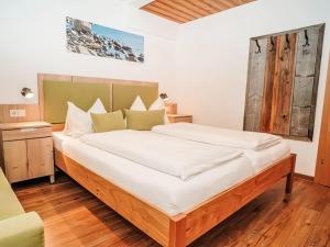 Ένα ή περισσότερα κρεβάτια σε δωμάτιο στο Apartment Kirschbaum by Interhome