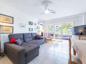 a living room with a couch and a table at Apartment Navio by Interhome in Aguadulce