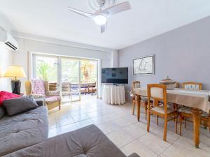 a living room with a couch and a table at Apartment Navio by Interhome in Aguadulce +19 photos