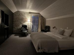 Hotel Säntis Teufen客房内的一张或多张床位