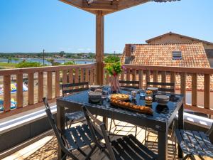 Balkón nebo terasa v ubytování Apartment La Pergola by Interhome