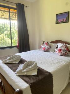 Postel nebo postele na pokoji v ubytování Serenity Casa II