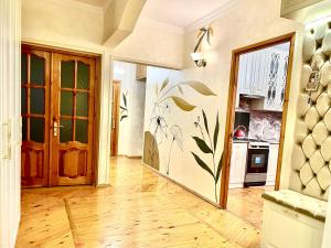 Η κουζίνα ή μικρή κουζίνα στο Spacious family apartment +11 φωτογραφίες