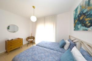 Postel nebo postele na pokoji v ubytování Apartment Lorraine - Duplex, With Pool & Sun Deck + 22 fotografií