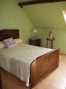 Postel nebo postele na pokoji v ubytování chambre d hotes les jonquilles