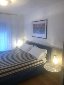 Postelja oz. postelje v sobi nastanitve Residence Principi di Piemonte