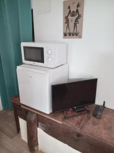 Kuchyň nebo kuchyňský kout v ubytování Coté Bouble Chantelle 03140