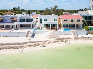 an aerial view of a house on the beach at PENINSULA STAYS 4BR Beach House @ PROGRESO The Best Location in the Yucatan in Progreso