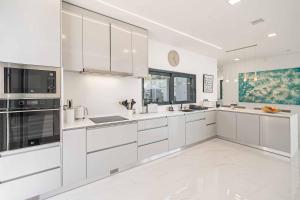 Η κουζίνα ή μικρή κουζίνα στο Villa Seacrest
