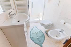 Koupelna v ubytování Cinnamon LakeHouse + 37 fotografií