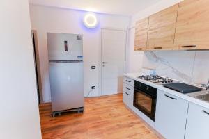 Kuchyň nebo kuchyňský kout v ubytování Cinnamon LakeHouse