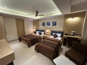 Postel nebo postele na pokoji v ubytování Hotel Sabera
