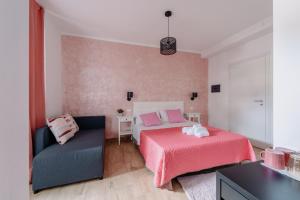 Postel nebo postele na pokoji v ubytování Franciacorta Rooms