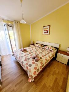 Posteľ alebo postele v izbe v ubytovaní Apartman Jopa