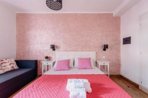 Postel nebo postele na pokoji v ubytování Franciacorta Rooms