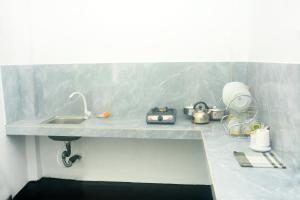 Η κουζίνα ή μικρή κουζίνα στο ASHI VILLA