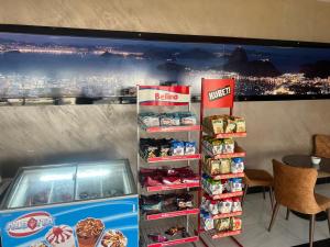 a food cart in a fast food restaurant with food at Hotel Rio in Lushnjë